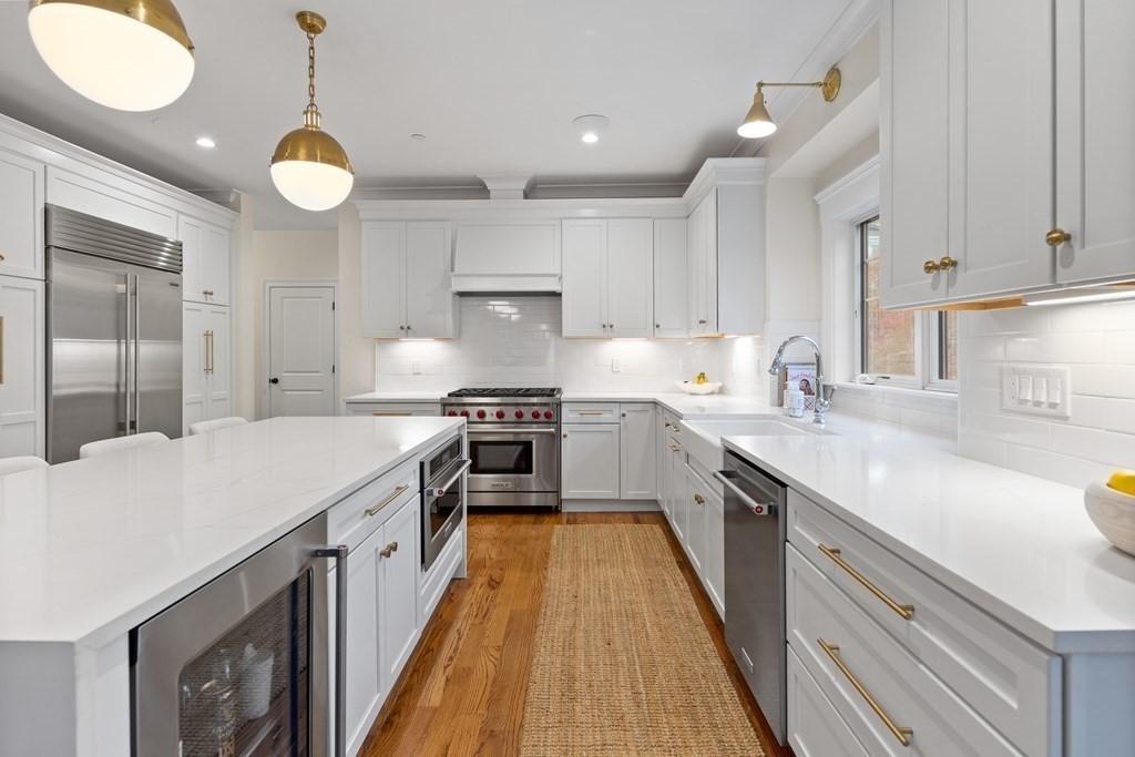 2 Five Paths Wayland, MA 01778 - Photo 12 of 26 a kitchen with granite countertop a sink a counter space appliances and cabinets