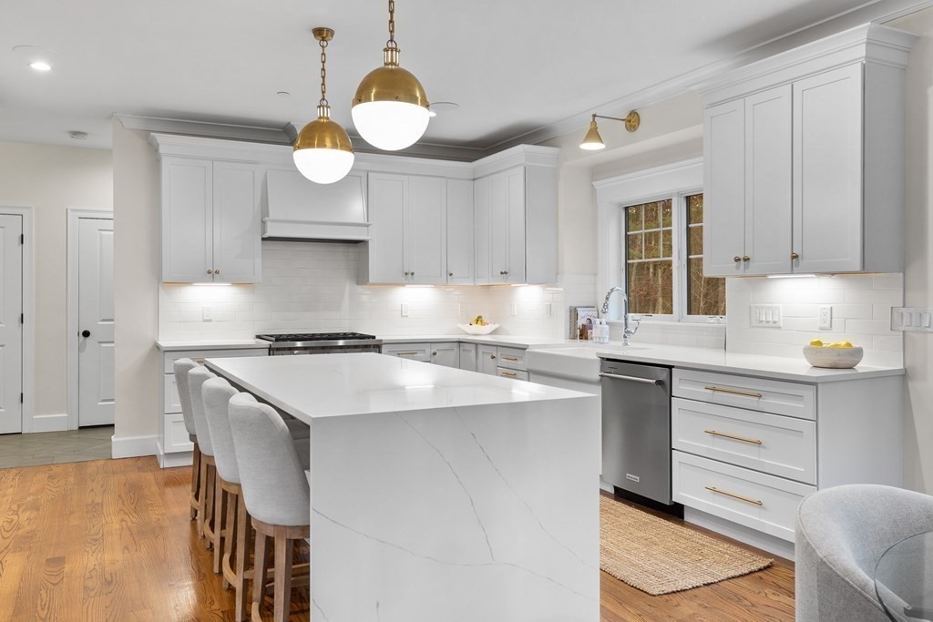 2 Five Paths Wayland, MA 01778 - Photo 15 of 26 a kitchen with a sink stove and cabinets