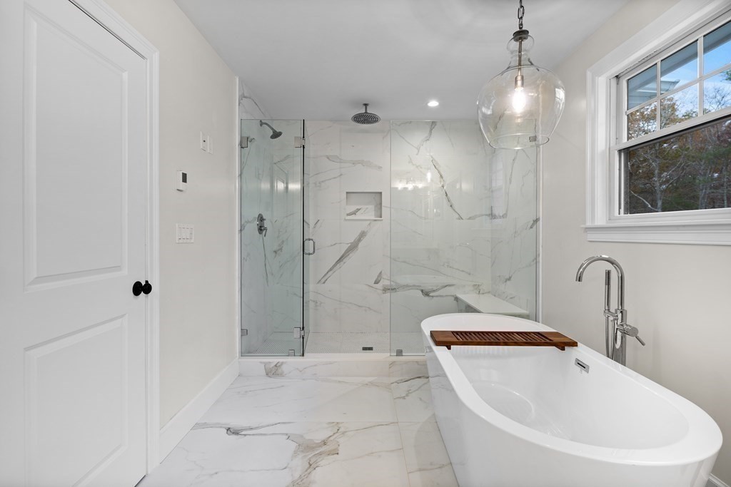 2 Five Paths Wayland, MA 01778 - Photo 24 of 26 a bathroom with a tub a sink and a large mirror