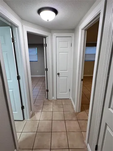 a view of an empty room with window