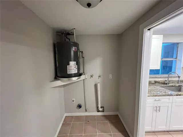 a view of a room with a large window