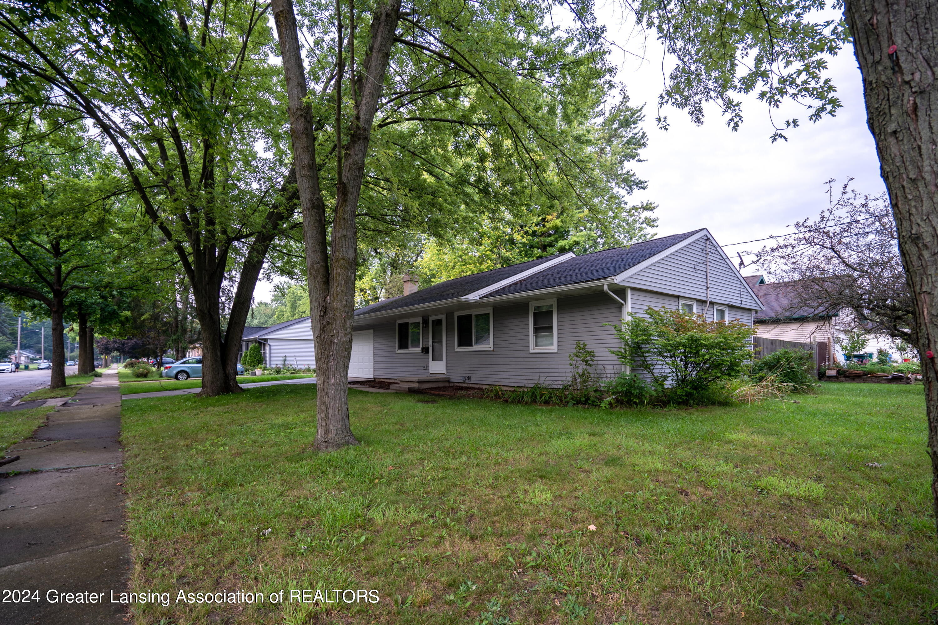 3227 Sunderland Road Lansing, MI 48911 - Photo 2 of 17 Front