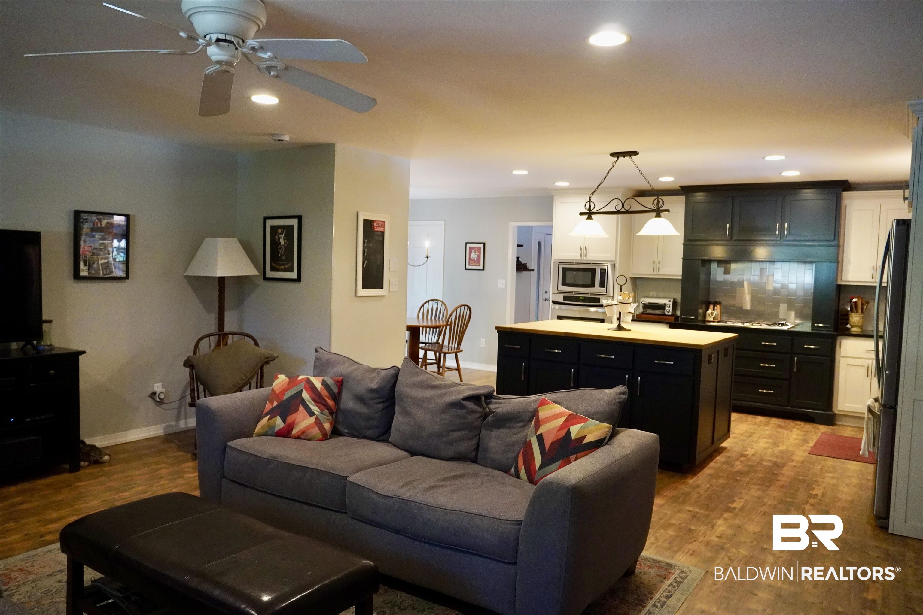 117 Belle Meade Brewton, AL 36426 - Photo 11 of 62 Living room with wood-type flooring and ceiling fan
