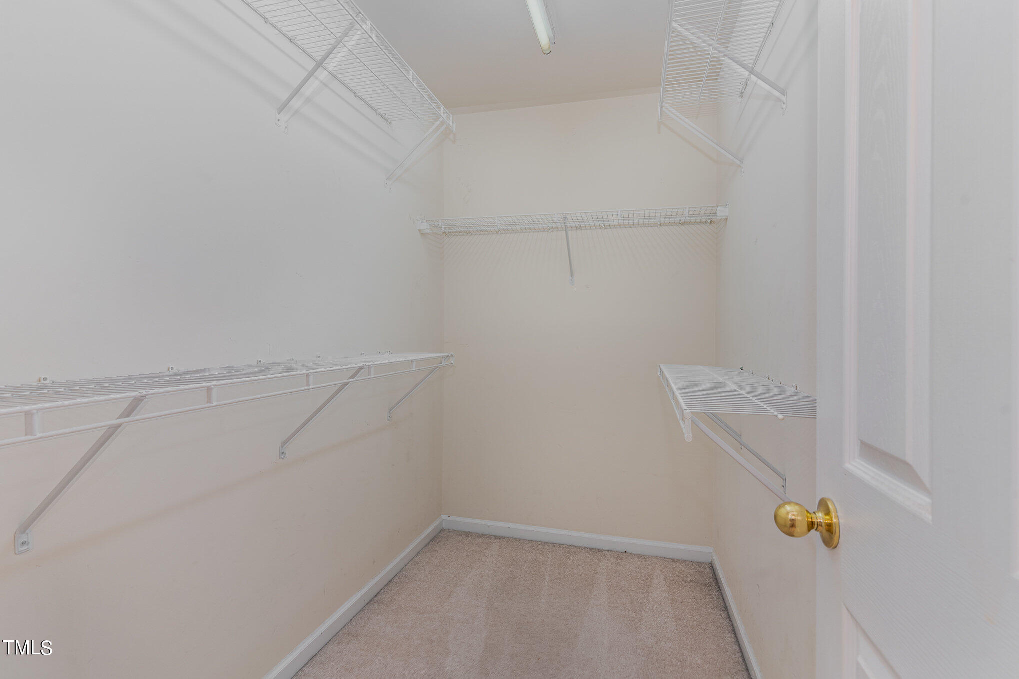 7247 Corvette Court Raleigh, NC 27613 - Photo 15 of 34 Walk in closet for primary bedroom