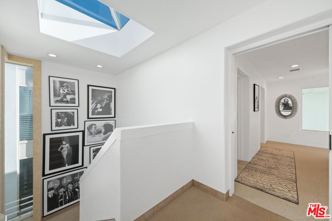 25302 Malibu Road Malibu, CA 90265 - Photo 11 of 36 a view of a hallway with bathroom and shower