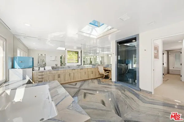 a living room with a couch and a view of living room