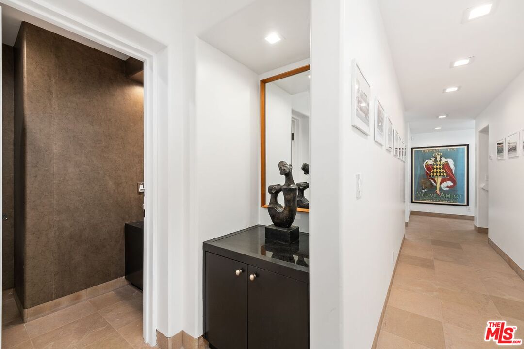 25302 Malibu Road Malibu, CA 90265 - Photo 20 of 36 a view of a hallway with a livingroom and a bathroom
