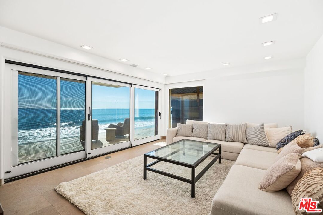 25302 Malibu Road Malibu, CA 90265 - Photo 23 of 36 a living room with furniture and a large window