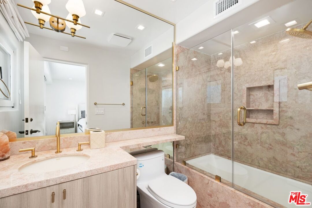 25302 Malibu Road Malibu, CA 90265 - Photo 27 of 36 a bathroom with a sink a toilet and shower