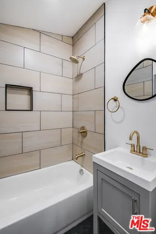 a bathroom with a sink and a bathtub