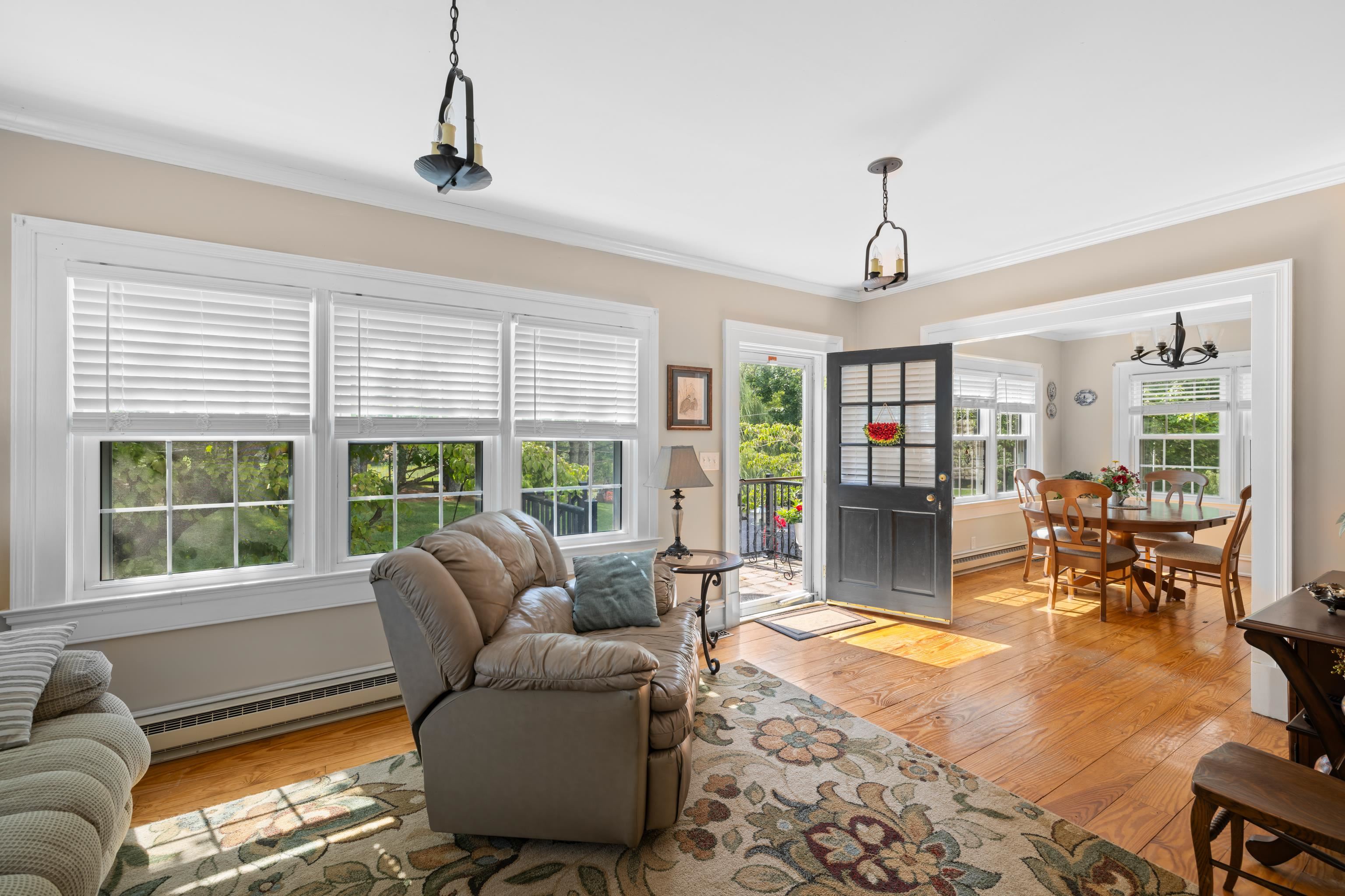1202 Walkers Creek Road Middlebrook, VA 24459 - Photo 22 of 74 a living room with furniture windows and a dining table
