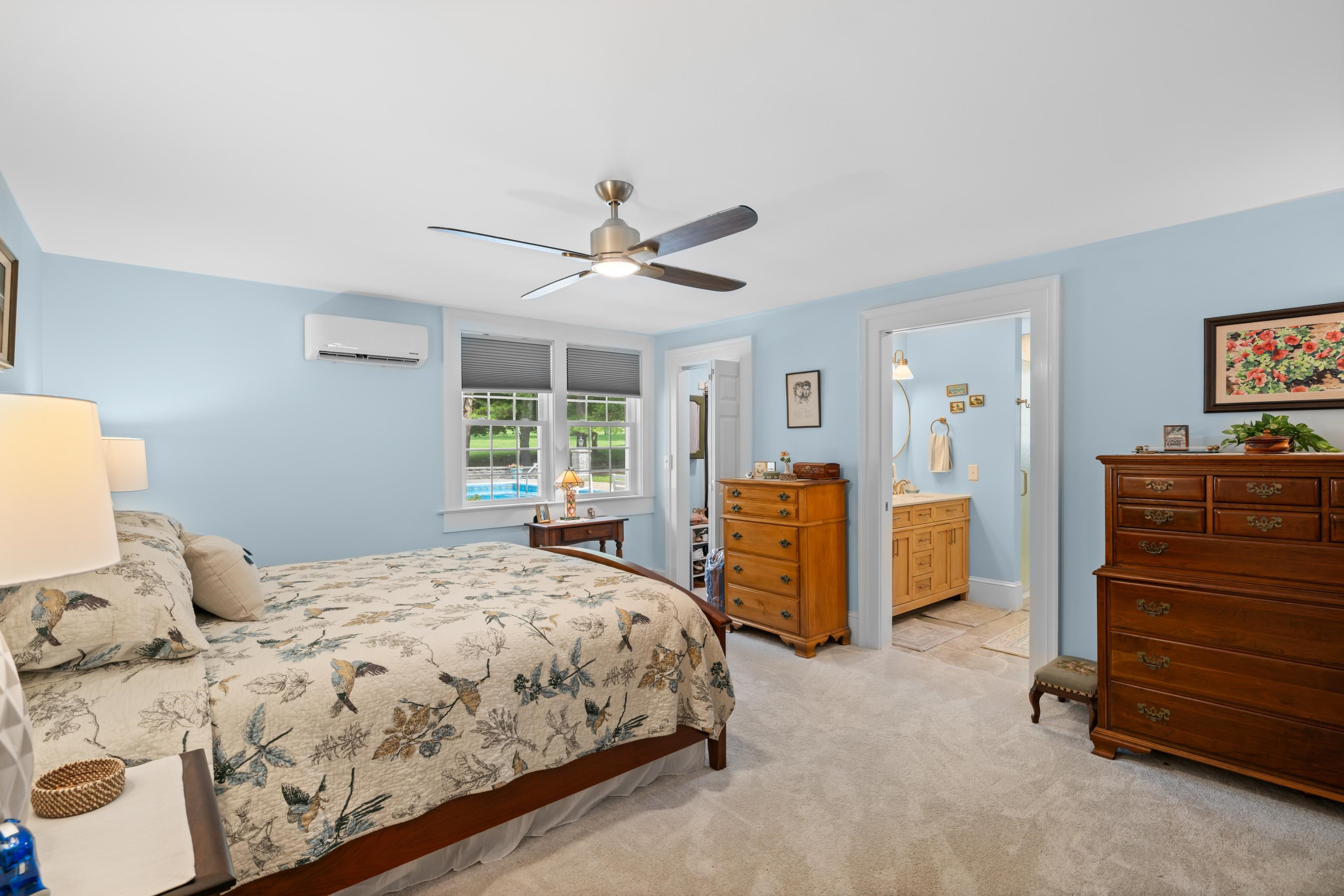 1202 Walkers Creek Road Middlebrook, VA 24459 - Photo 24 of 74 a bedroom with a bed and a flat tv screen on dresser