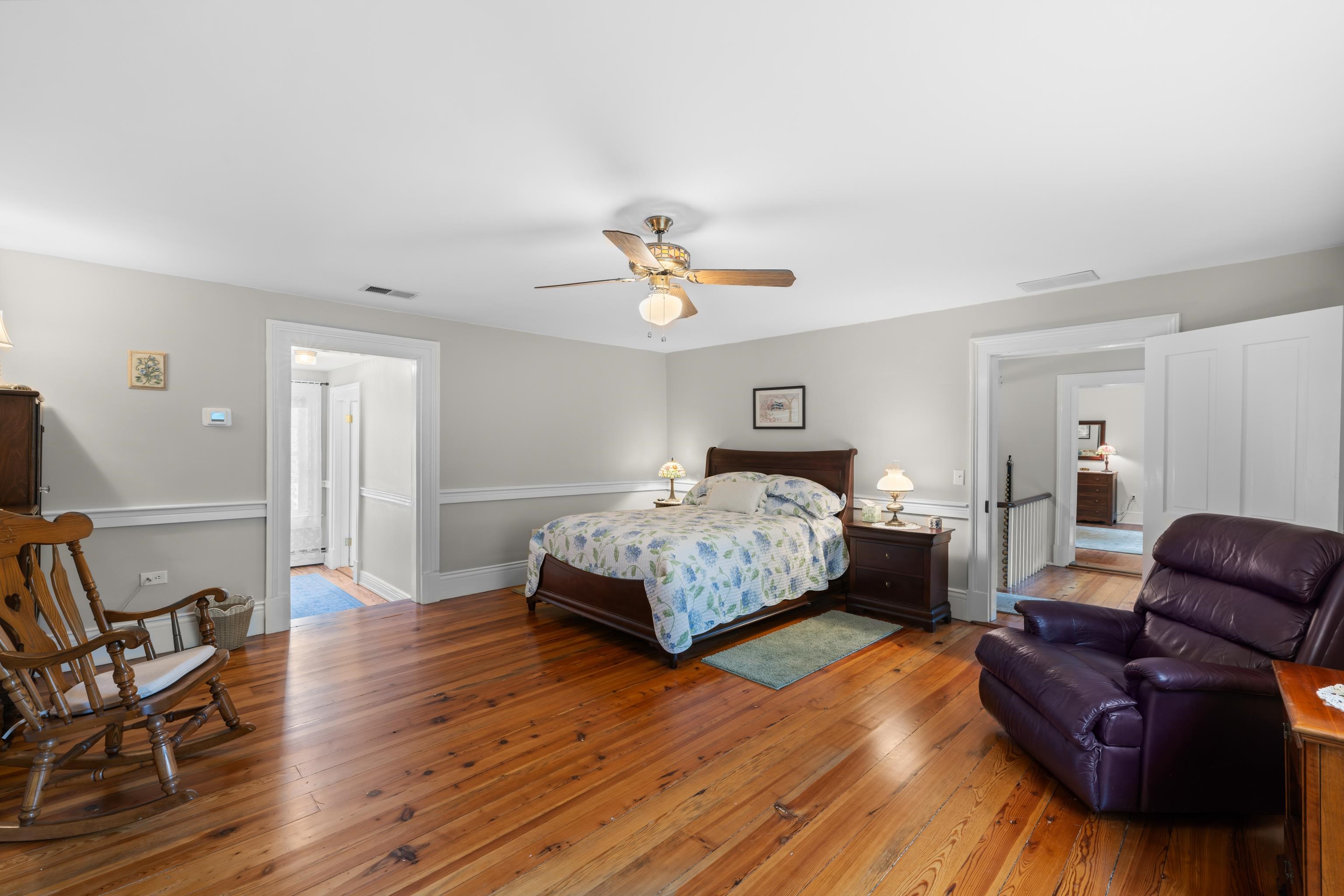 1202 Walkers Creek Road Middlebrook, VA 24459 - Photo 31 of 74 a living room with furniture and a wooden floor