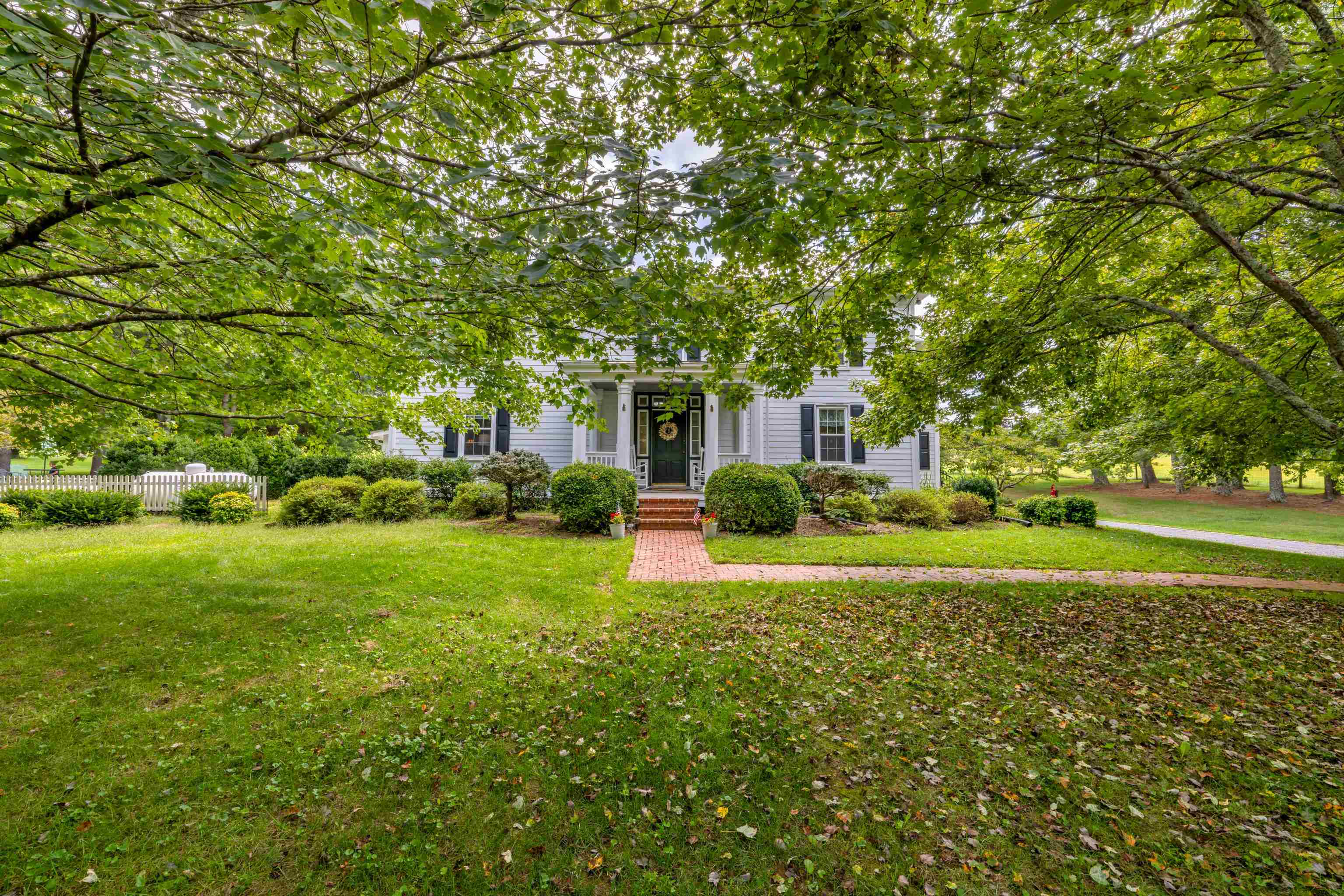 1202 Walkers Creek Road Middlebrook, VA 24459 - Photo 4 of 74 a front view of a house with garden