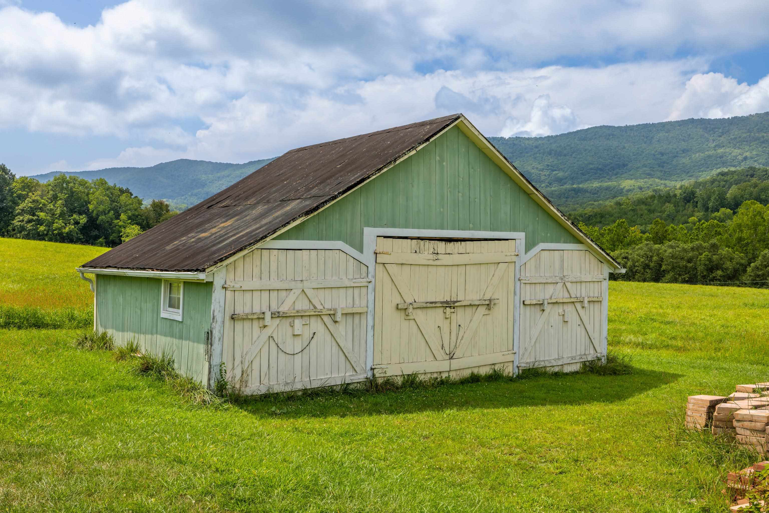 1202 Walkers Creek Road Middlebrook, VA 24459 - Photo 62 of 74 a view of an house with backyard space and garden