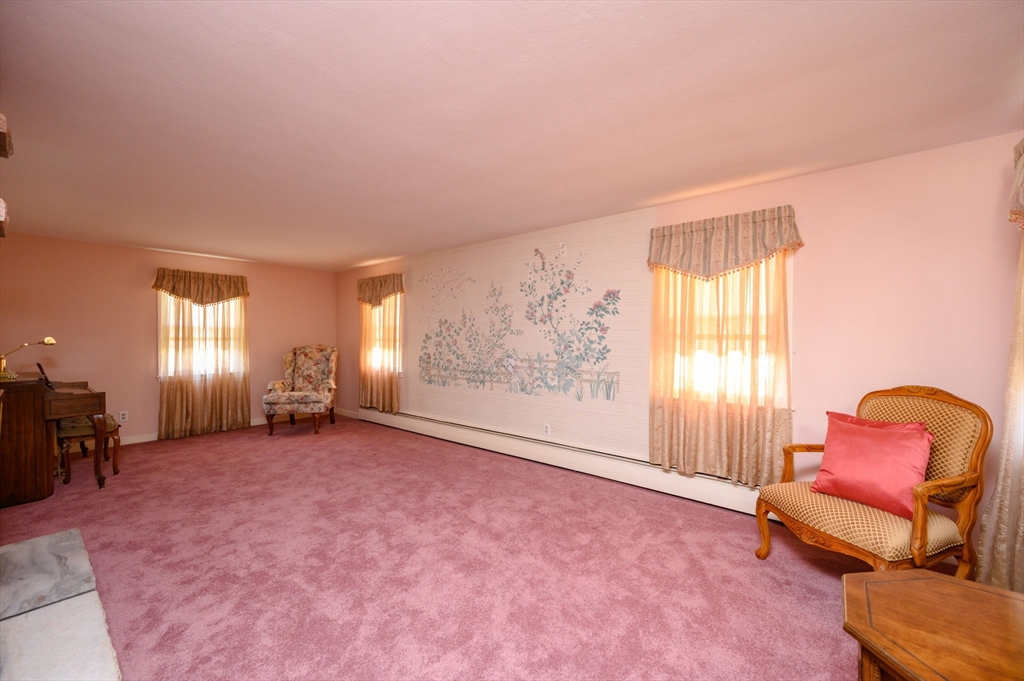61 Grove Street Braintree, MA 02184 - Photo 15 of 29 a view of a room with furniture and a window