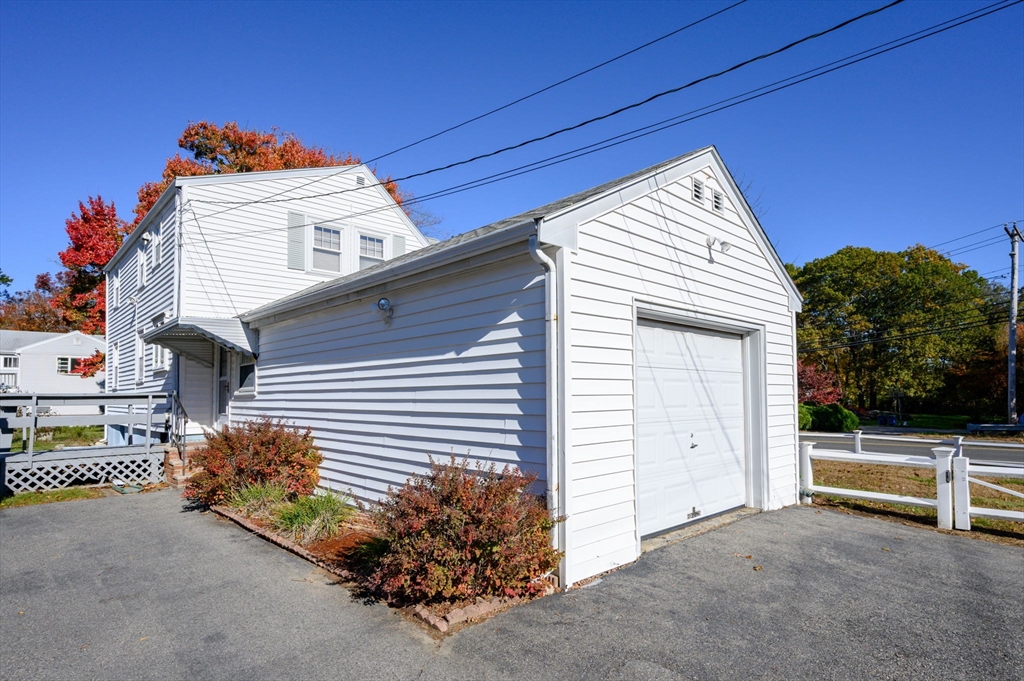 61 Grove Street Braintree, MA 02184 - Photo 28 of 29 a view of a house with a garage