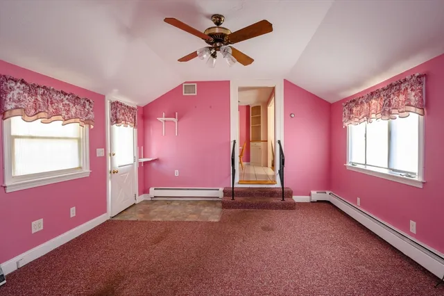 a view of livingroom with hardwood floor and a ceiling fan
