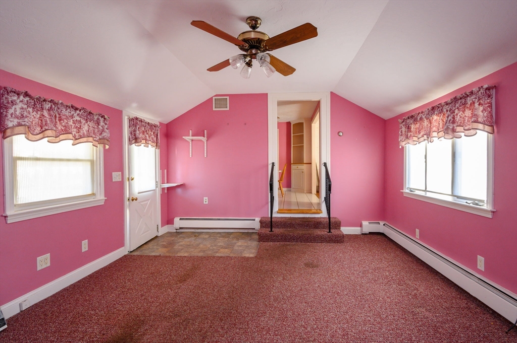 61 Grove Street Braintree, MA 02184 - Photo 5 of 29 a view of livingroom with hardwood floor and a ceiling fan