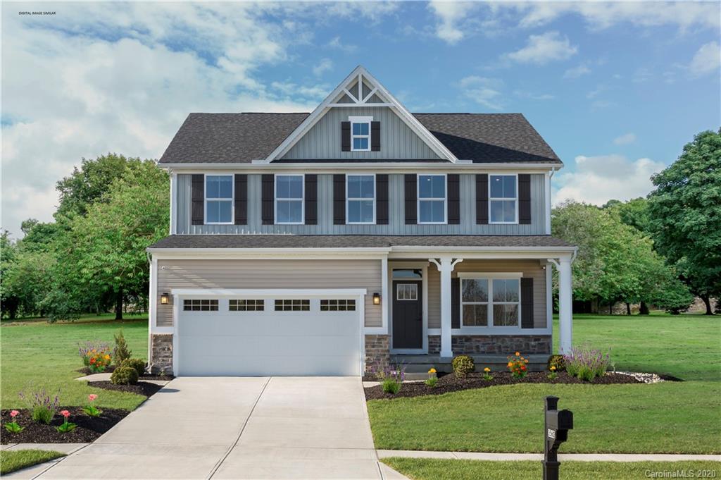 7108 Messina Road, Unit 137 Indian Land, SC 29707 - Photo 1 of 13 a front view of a house with a yard