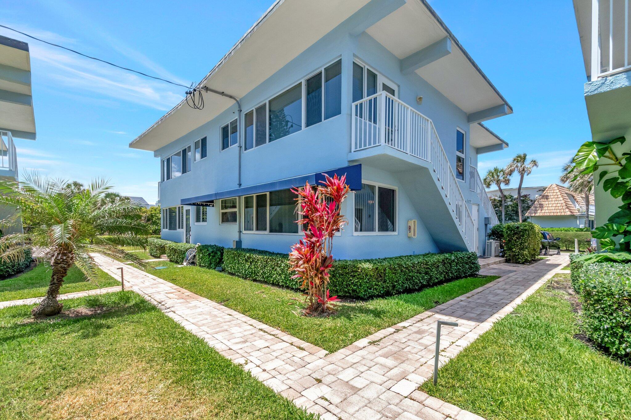 5700 Old Ocean Boulevard, Unit R Ocean Ridge, FL 33435 - Photo 13 of 20 a front view of a house with a yard