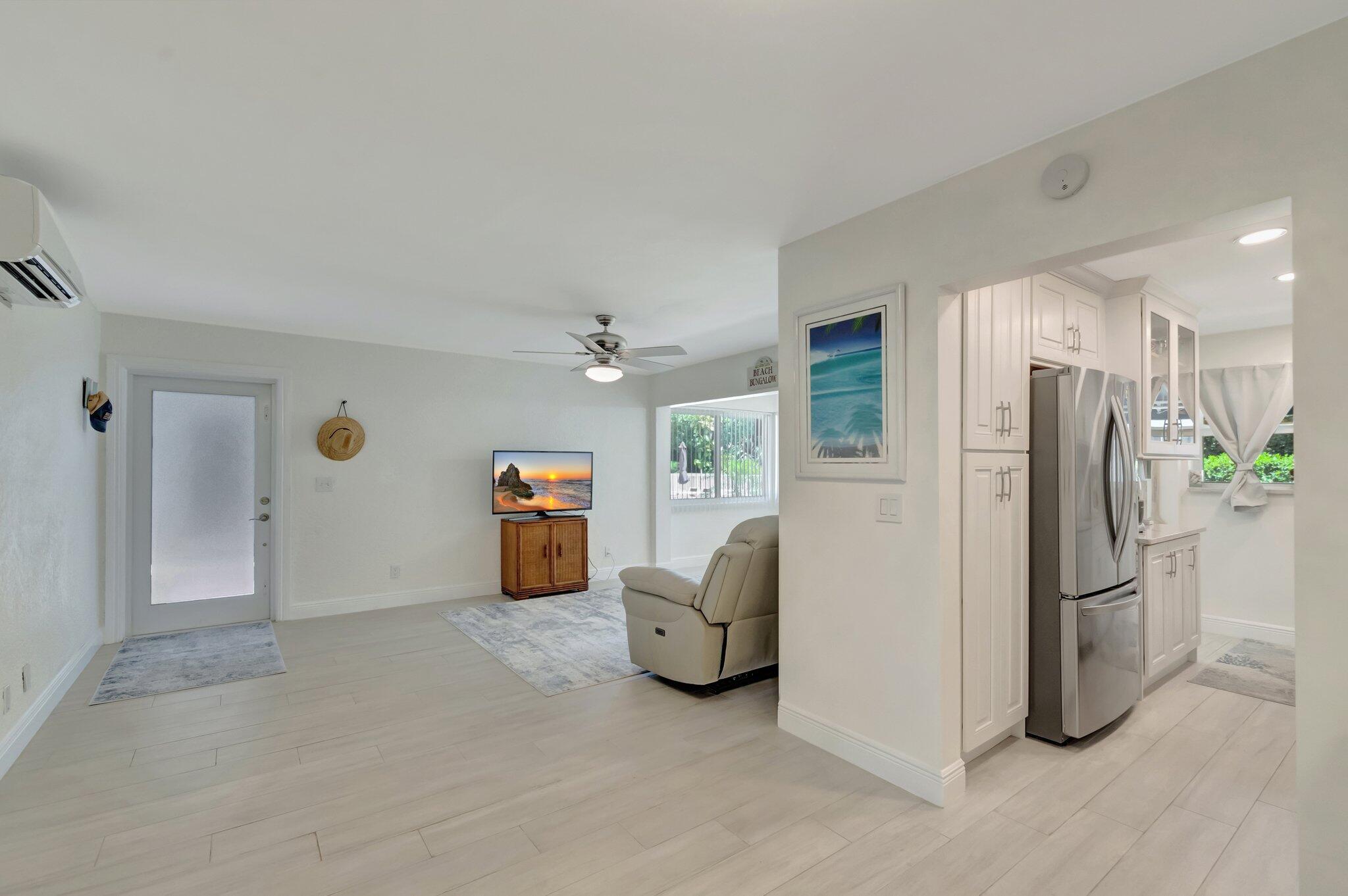 5700 Old Ocean Boulevard, Unit R Ocean Ridge, FL 33435 - Photo 7 of 20 a view of a livingroom with furniture and a hallway