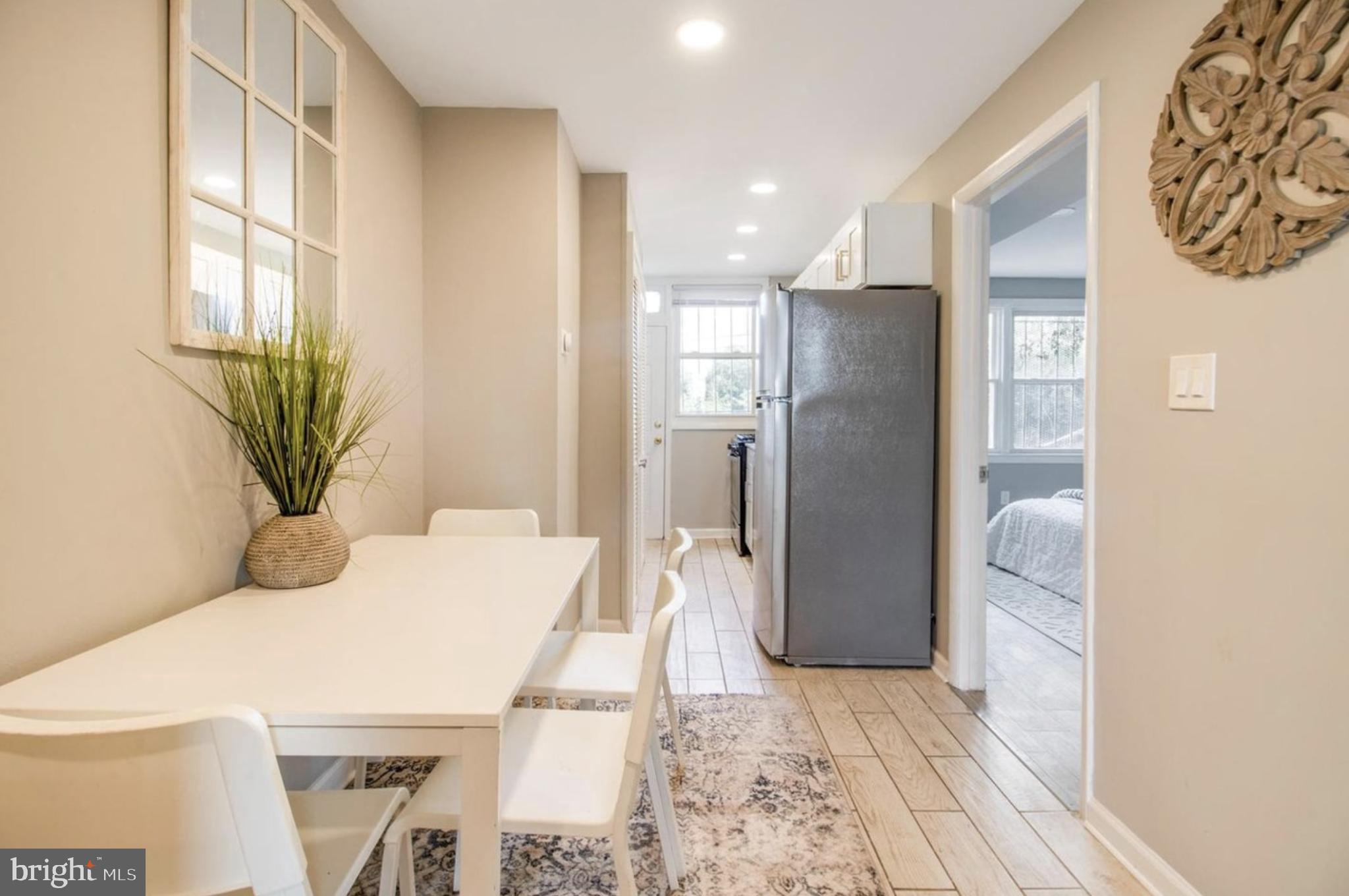 1149 Summit Street Northeast, Unit 2 Washington, DC 20002 - Photo 6 of 14 a bathroom with a bathtub and shower