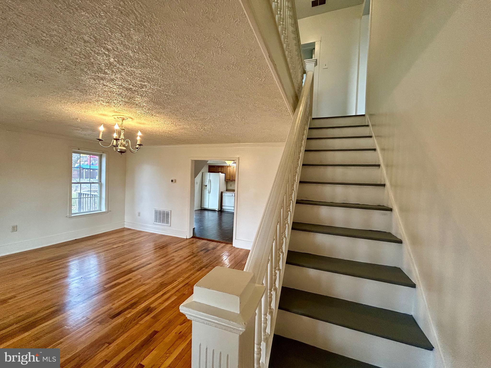 2266 Henshaw Road Inwood, WV 25428 - Photo 15 of 25 a view of entryway and hall with wooden floor