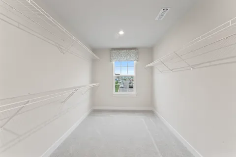 a bathroom with a sink and a window