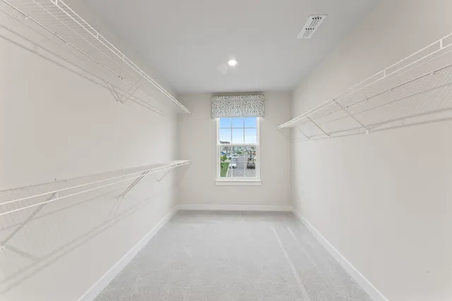 a bathroom with a sink and a window