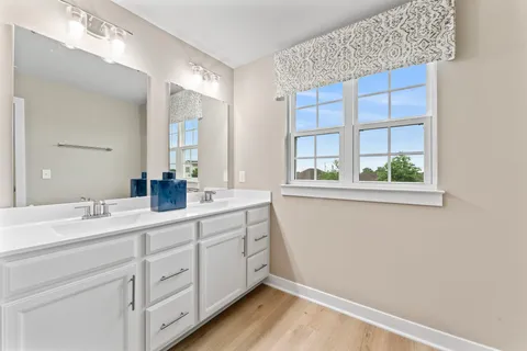 a bathroom with a shower and a toilet