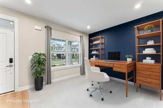 a room with furniture piano and window