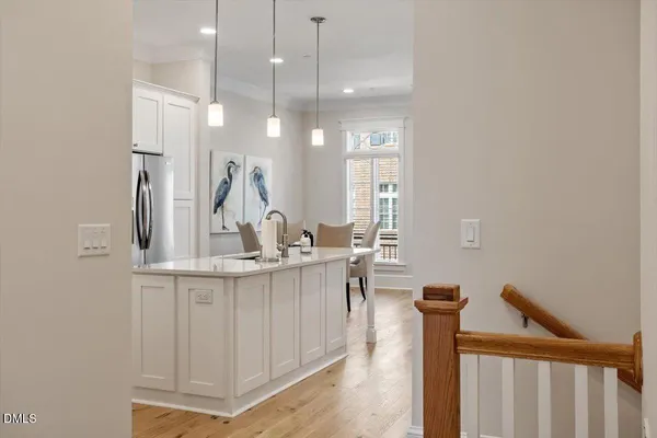 a en suite bathroom with a sink and mirror