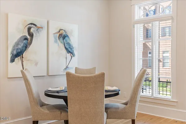 a bed room with a bed and a chair