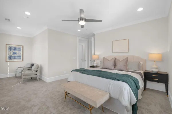 a bed room with a bed and mirror