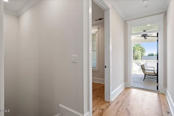 a view of a living room and a floor to ceiling window