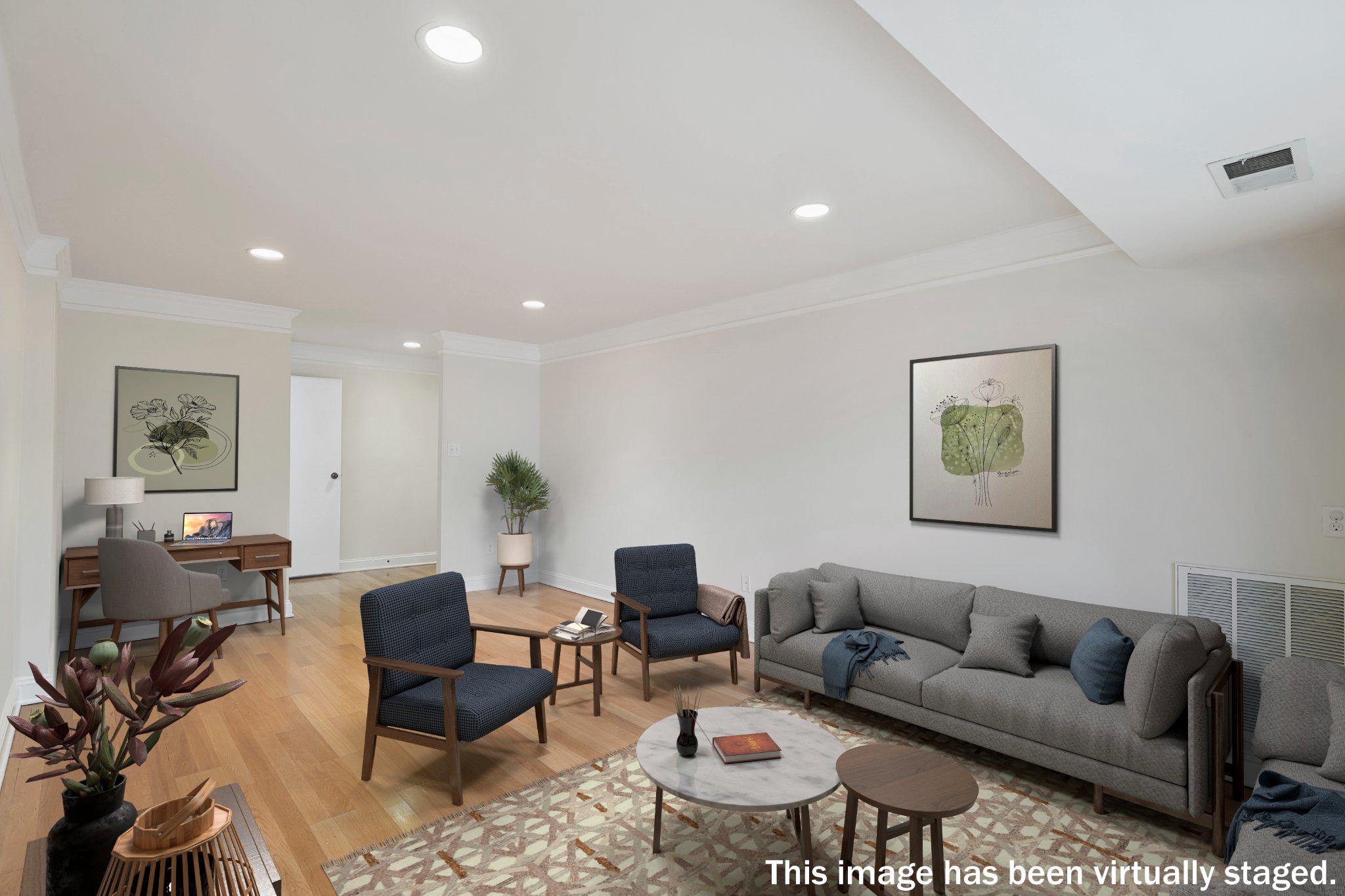 2037 Royal Fern Court, Unit 47/2C Reston, VA 20191 - Photo 11 of 48 a living room with furniture and a rug