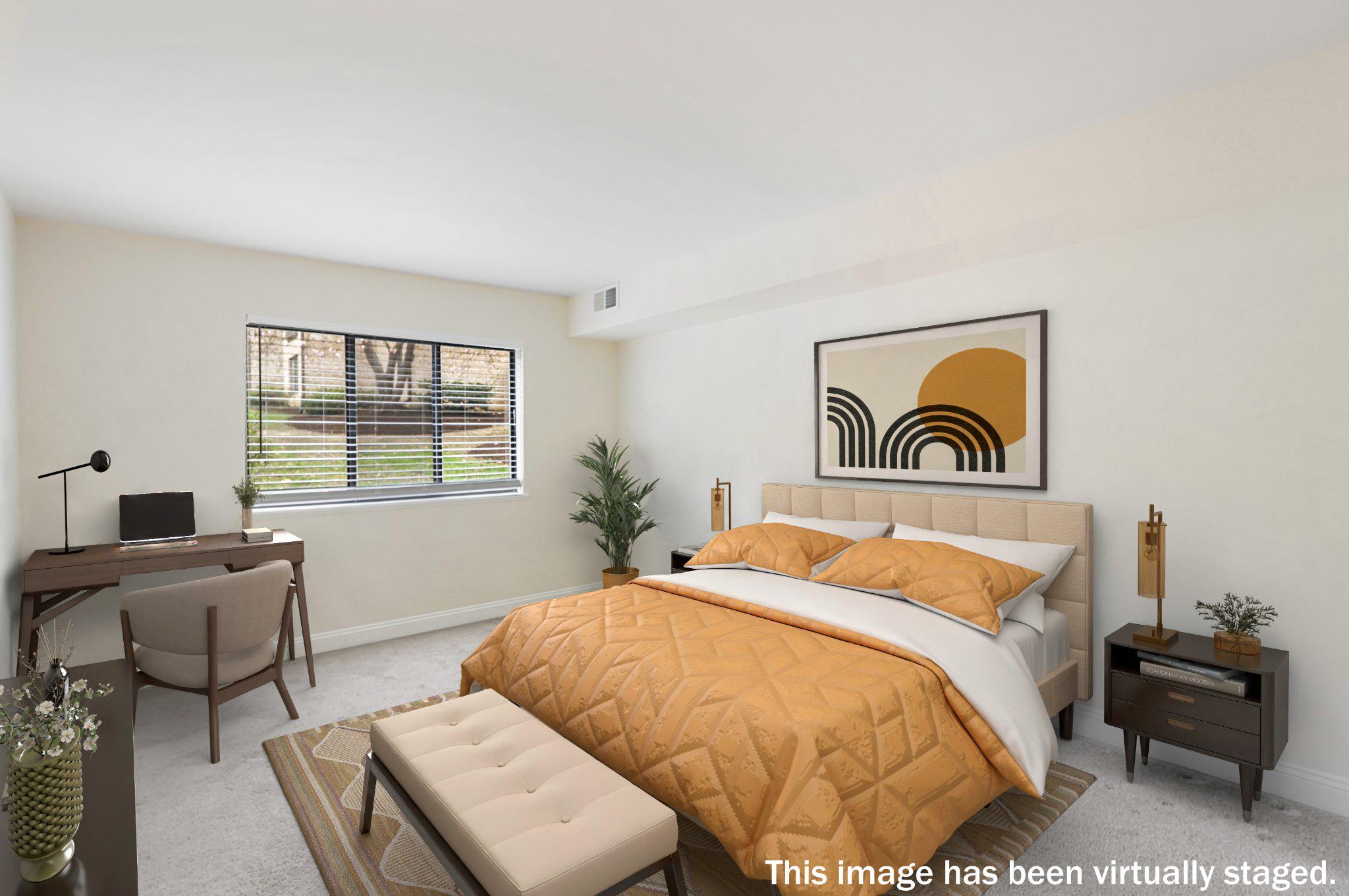 2037 Royal Fern Court, Unit 47/2C Reston, VA 20191 - Photo 30 of 48 a bedroom with a bed and a table in it