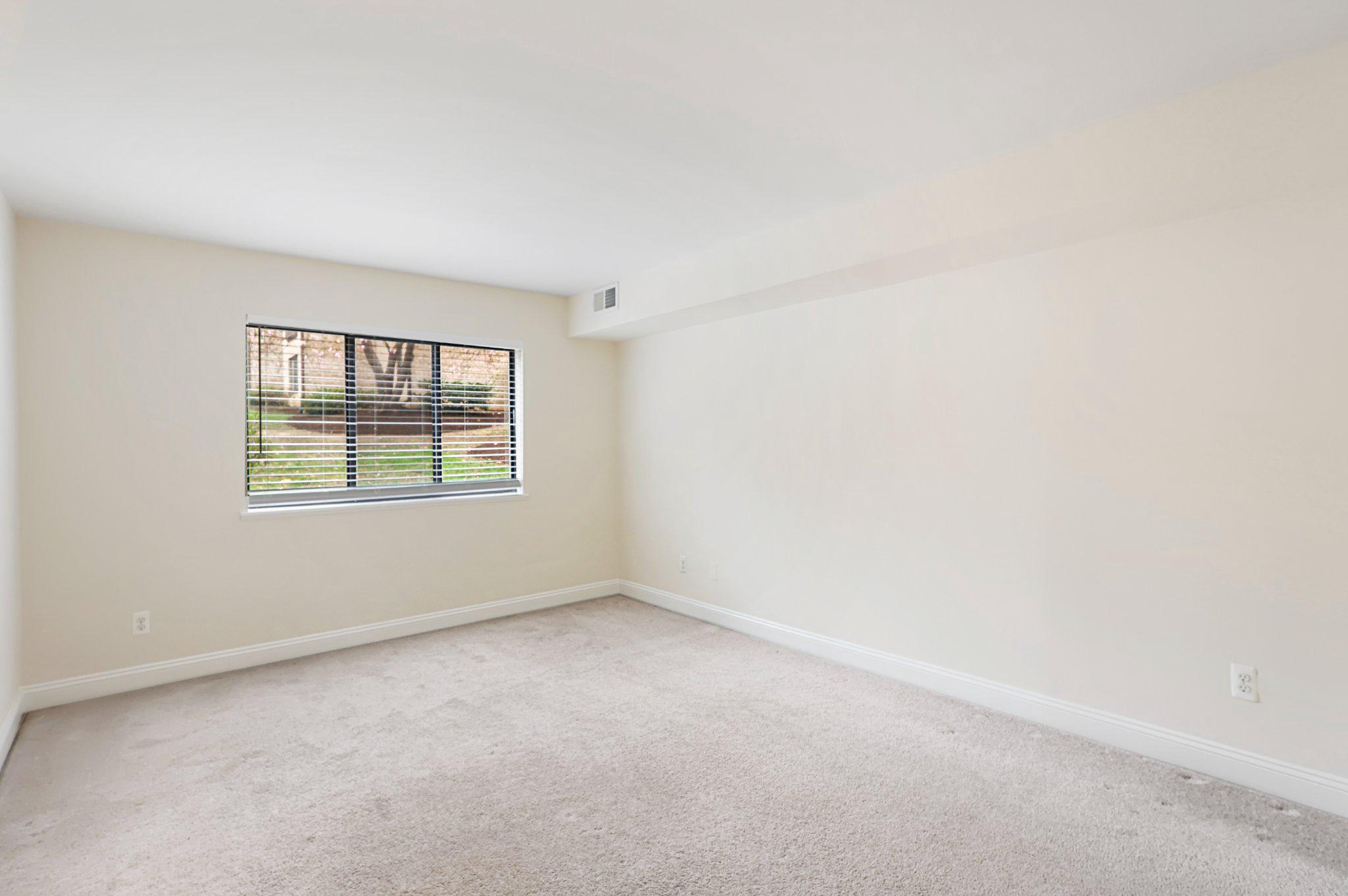 2037 Royal Fern Court, Unit 47/2C Reston, VA 20191 - Photo 31 of 48 an empty room with windows