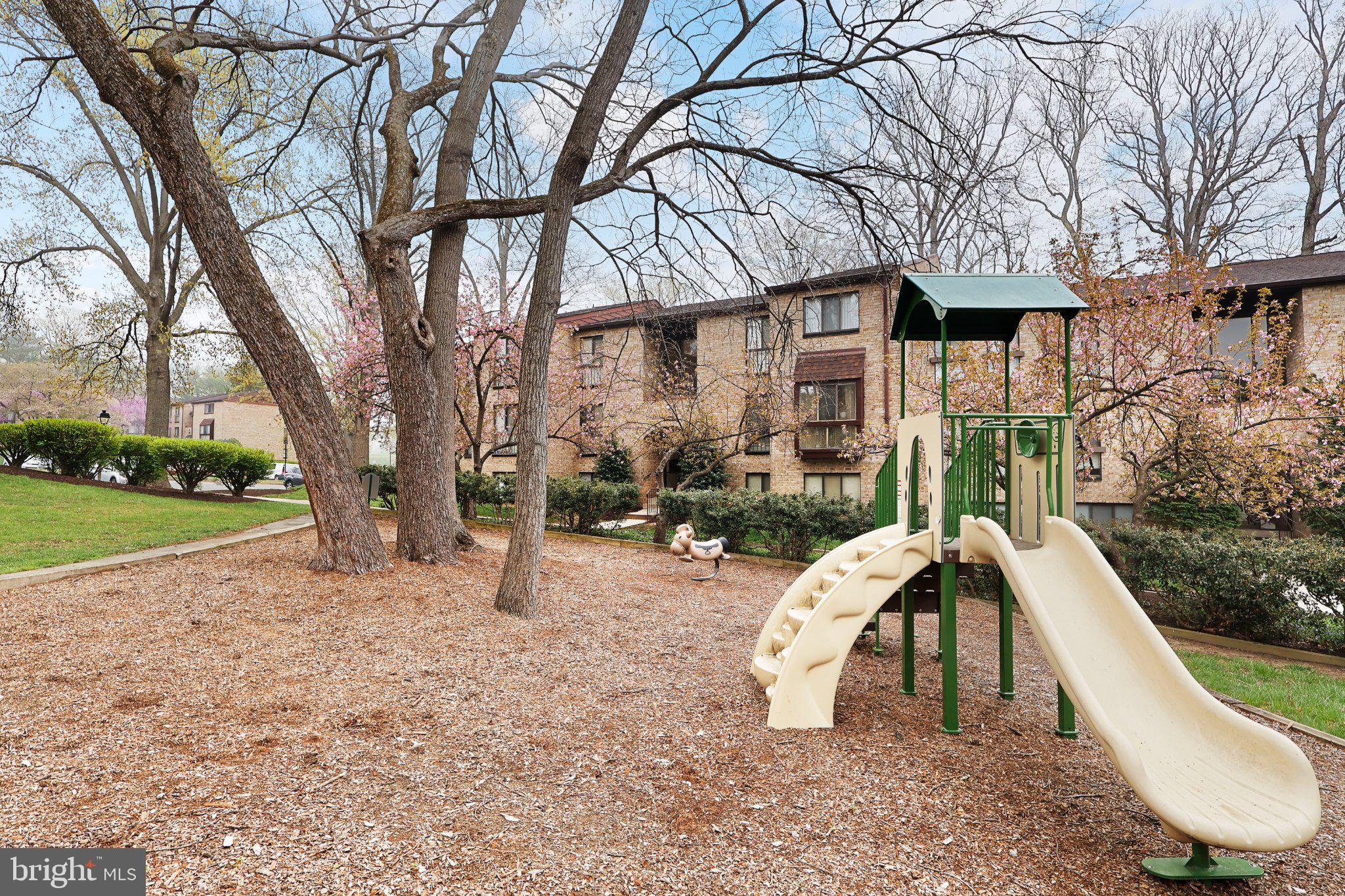 2037 Royal Fern Court, Unit 47/2C Reston, VA 20191 - Photo 41 of 48 a view of outdoor space yard deck patio and slide