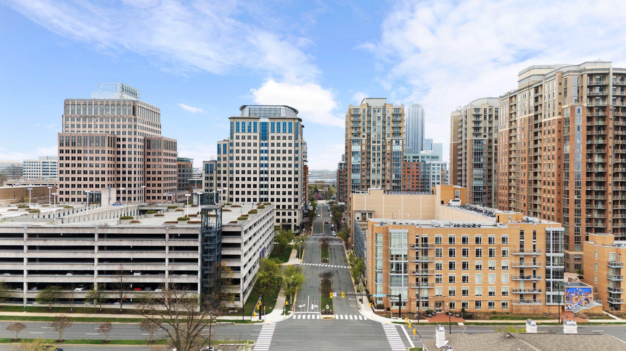 2037 Royal Fern Court, Unit 47/2C Reston, VA 20191 - Photo 44 of 48 a view of a city with tall buildings