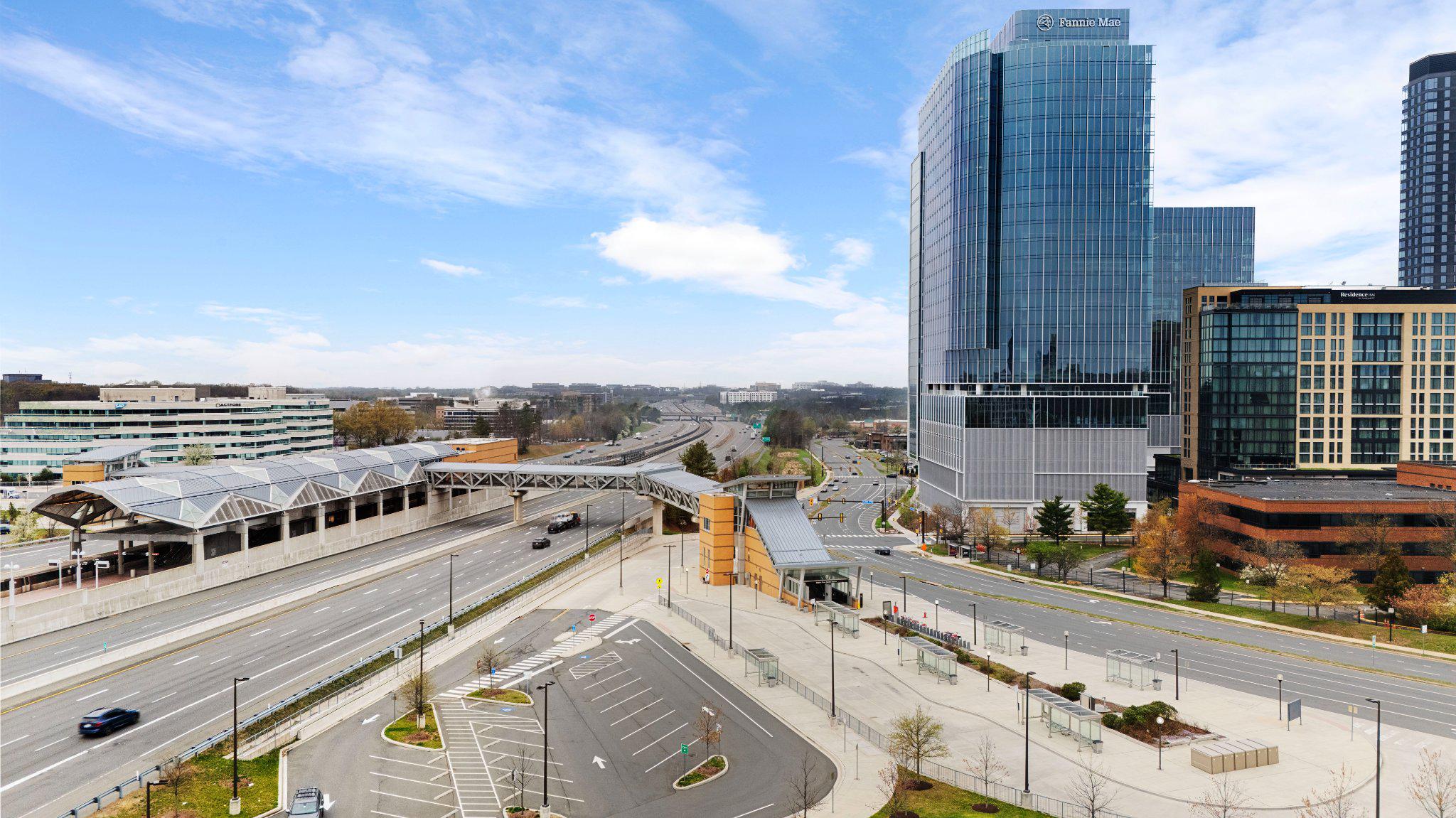 2037 Royal Fern Court, Unit 47/2C Reston, VA 20191 - Photo 47 of 48 a view of a city with tall buildings
