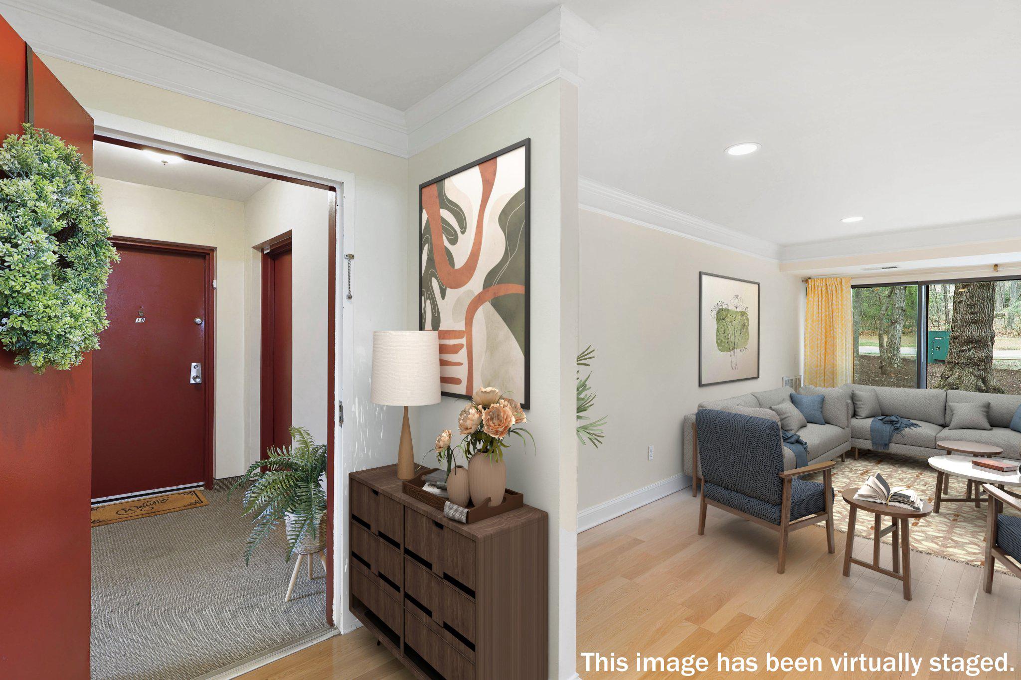 2037 Royal Fern Court, Unit 47/2C Reston, VA 20191 - Photo 6 of 48 a living room with furniture and a window