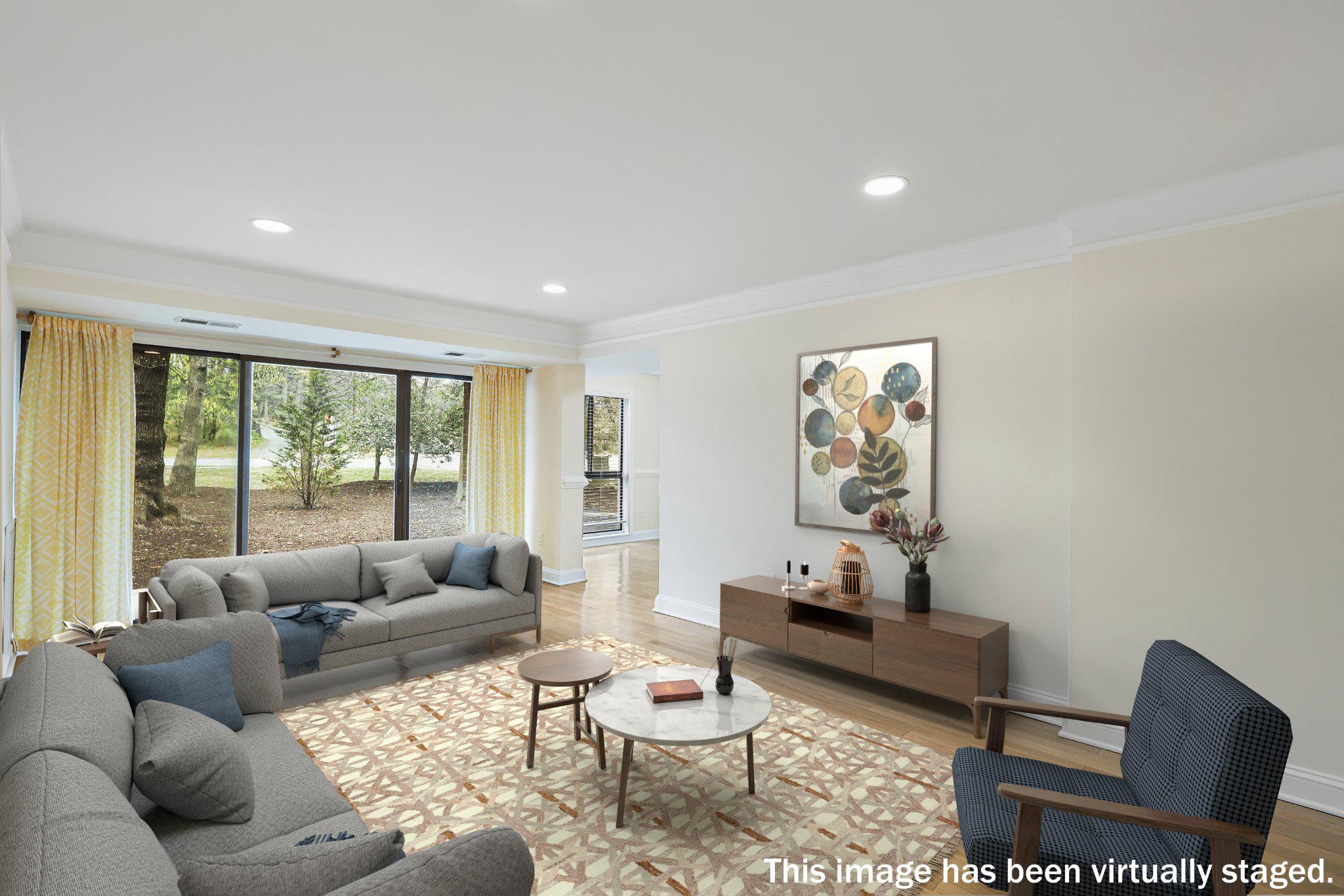 2037 Royal Fern Court, Unit 47/2C Reston, VA 20191 - Photo 9 of 48 a living room with furniture and a large window