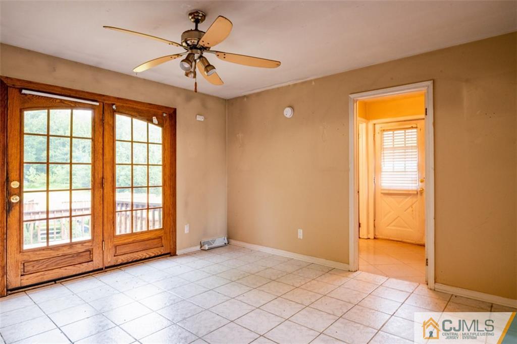 207 Fresh Ponds Road Monroe Township, NJ 08831 - Photo 12 of 25 a view of an empty room with a window