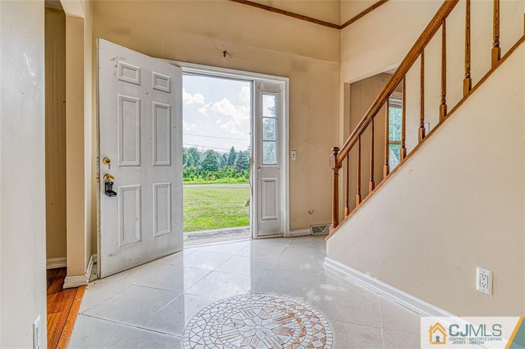 207 Fresh Ponds Road Monroe Township, NJ 08831 - Photo 16 of 25 a view of an entryway with staircase