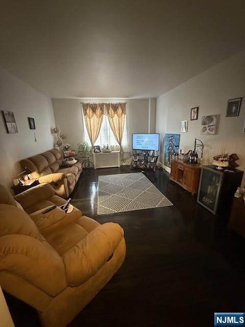 210 Hoboken Road, Unit 2A East Rutherford, NJ 07073 - Photo 2 of 15 a bed room with a bed furniture and a window