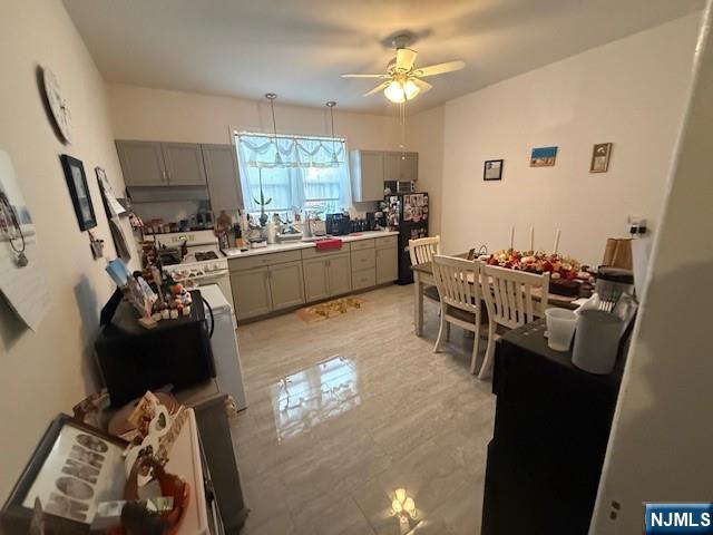210 Hoboken Road, Unit 2A East Rutherford, NJ 07073 - Photo 10 of 15 a living room with furniture and a large window