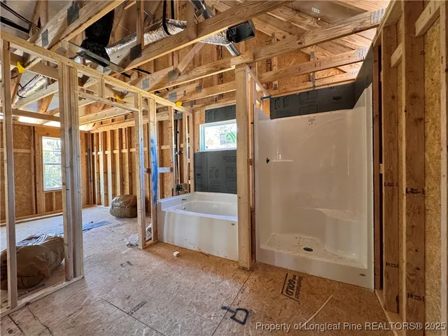 a view of a room with wooden walls