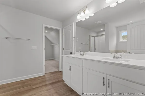a white bath tub sitting next to a window